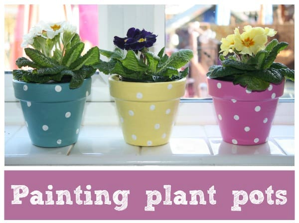 kid painted plant pots