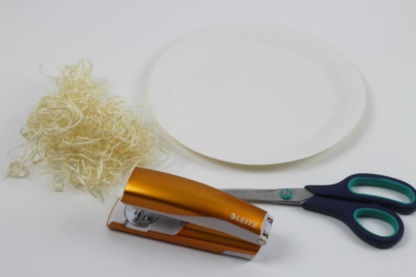Paper plate nests - Simple paper plate nests using recycled packing materials. This is an easy, effective craft for kids for Spring and Easter.
