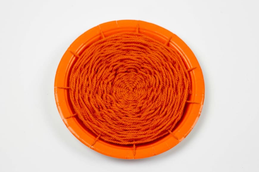 Pumpkin paper plate weaving