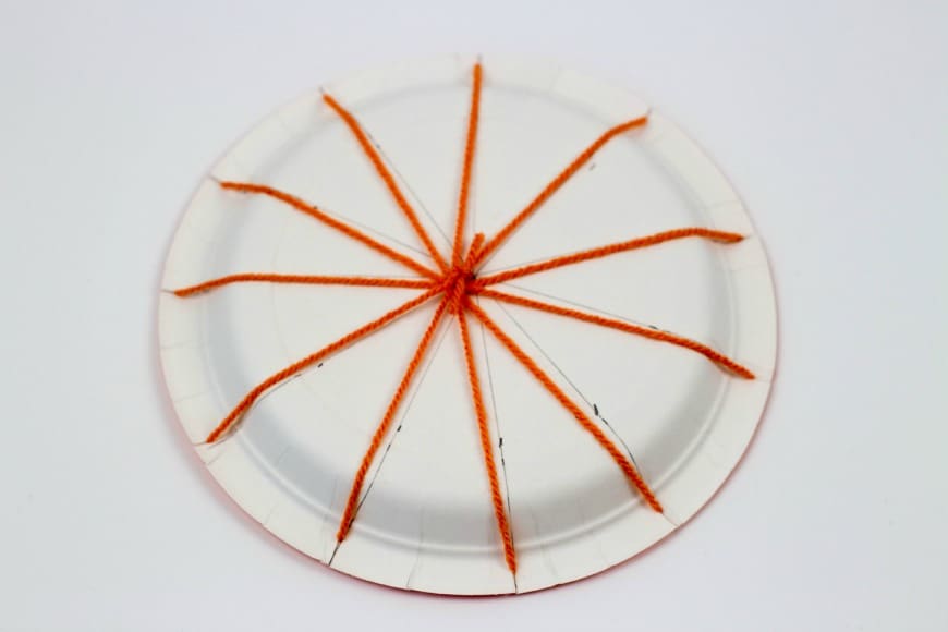 Pumpkin paper plate weaving