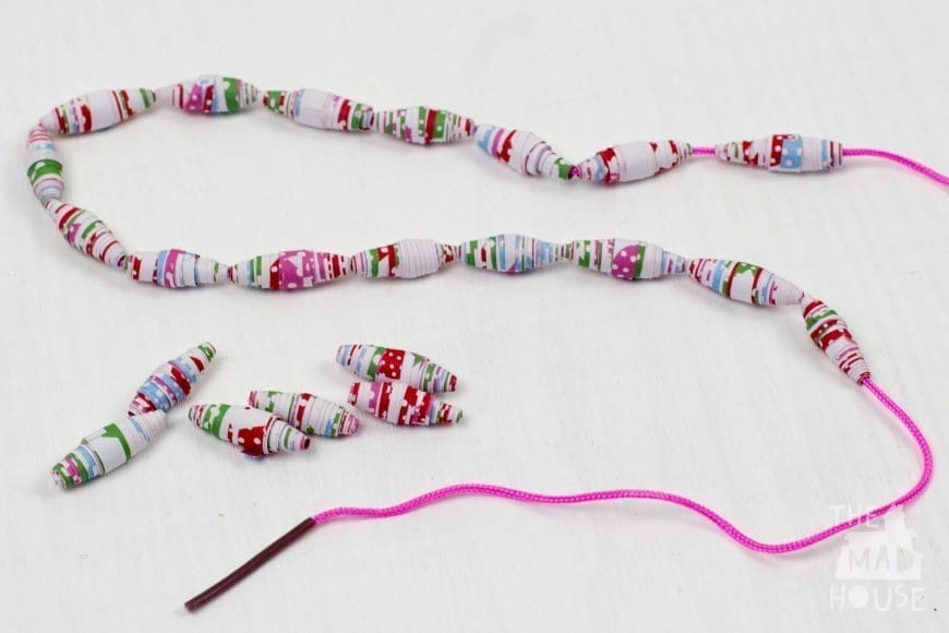How to make paper beads from wrapping paper. What a fab craft DIY for recycling paper into jewelry. These would make the perfect DIY gift for Mother's Day. I never realised it was THIS simple!