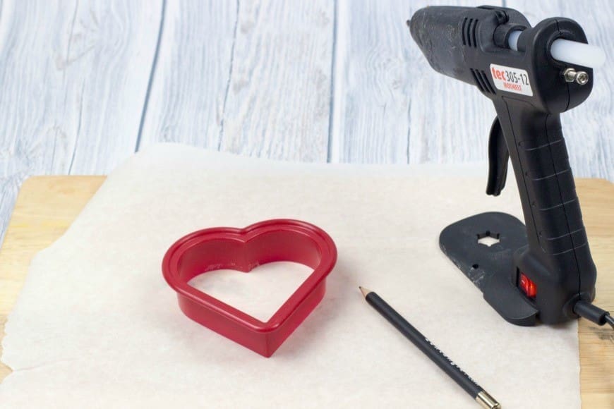 Hot Glue Gun Confetti Heart Cake Topper. This is a fab DIY craft to make a confetti heart, which is perfect as a cake topper for celebrations and if you only confetti one side they make a brilliant window cling. You could make any shape, letter, or number. You could even frame it as art instead of putting a toothpick in it as a cake topper