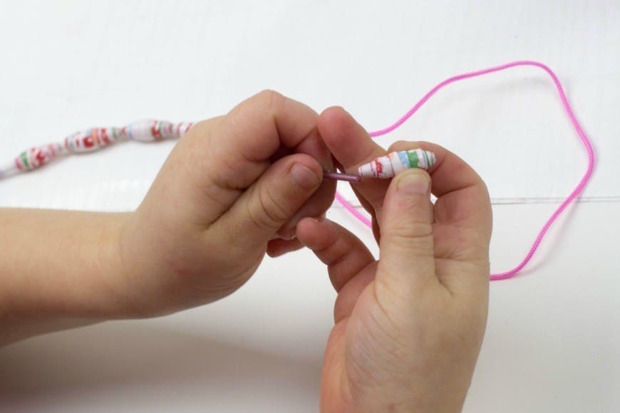 How to make paper beads from wrapping paper. What a fab craft DIY for recycling paper into jewelry. These would make the perfect DIY gift for Mother's Day. I never realised it was THIS simple!