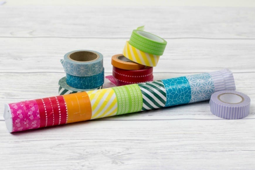 DIY Rainmaker or rainstick craft for kids. This is a super simple craft and musical instrument activity for children. Traditionally made from dried cacti, this simple DIY rainstick has the same sound and is also a perfect rainbow craft too