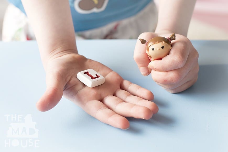 A fun simple DIY phonics game with Disney Tsum Tsums. This homemade kids phonics games is simple to put together using what you have at home and you can adjust it to use your child's favorite small toys such as Shopkins, fungus amungus. This is a super way to learn whilst playing.