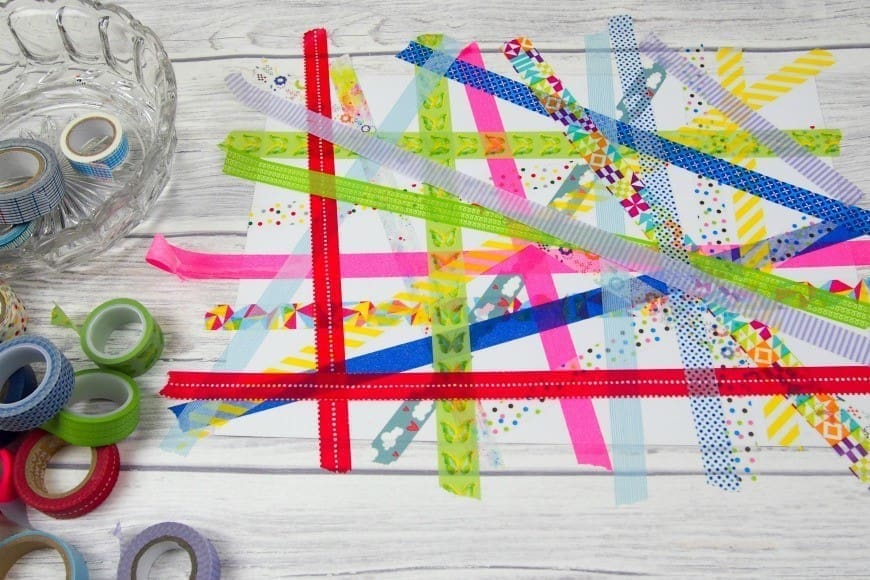 Washi Tape Easter Bunting.  This is a fab DIY craft that is perfect for kids to celebrate Easter and spring.  A simple children’s process art activity that makes a beautiful Easter Decoration.