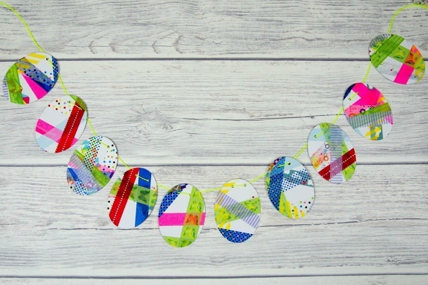 Washi Tape Easter Bunting.  This is a fab DIY craft that is perfect for kids to celebrate Easter and spring.  A simple children’s process art activity that makes a beautiful Easter Decoration.