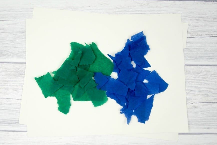 Bleeding Tissue Paper Rain Art for Earth Day. This fab process art is great for getting kids crafting outside. Beautiful art made by kids using the bleeding tissue paper technique.