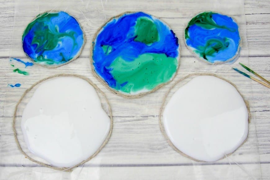 You will never guess what this beautiful stained glass Earth craft is made from. It is a fab fun kids craft perfect for celebrating Earth Day