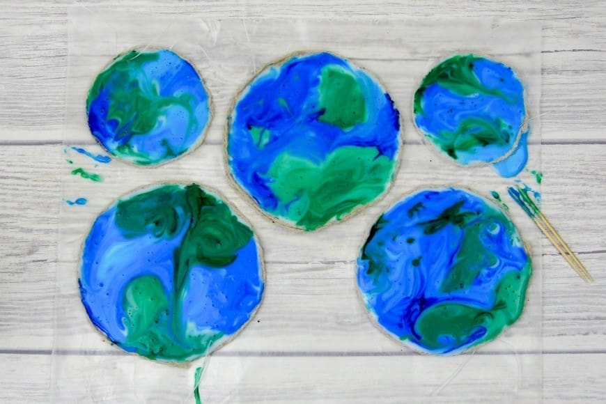 You will never guess what this beautiful stained glass Earth craft is made from. It is a fab fun kids craft perfect for celebrating Earth Day