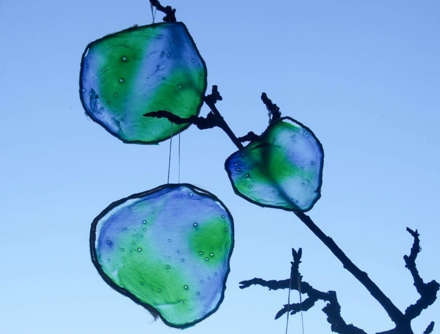 You will never guess what this beautiful stained glass Earth craft is made from. It is a fab fun kids craft perfect for celebrating Earth Day