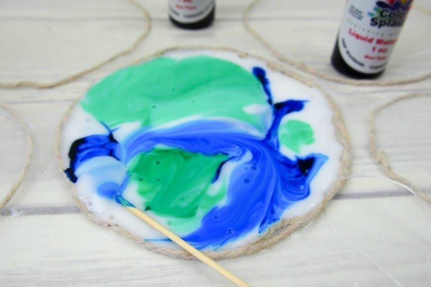 You will never guess what this beautiful stained glass Earth craft is made from. It is a fab fun kids craft perfect for celebrating Earth Day