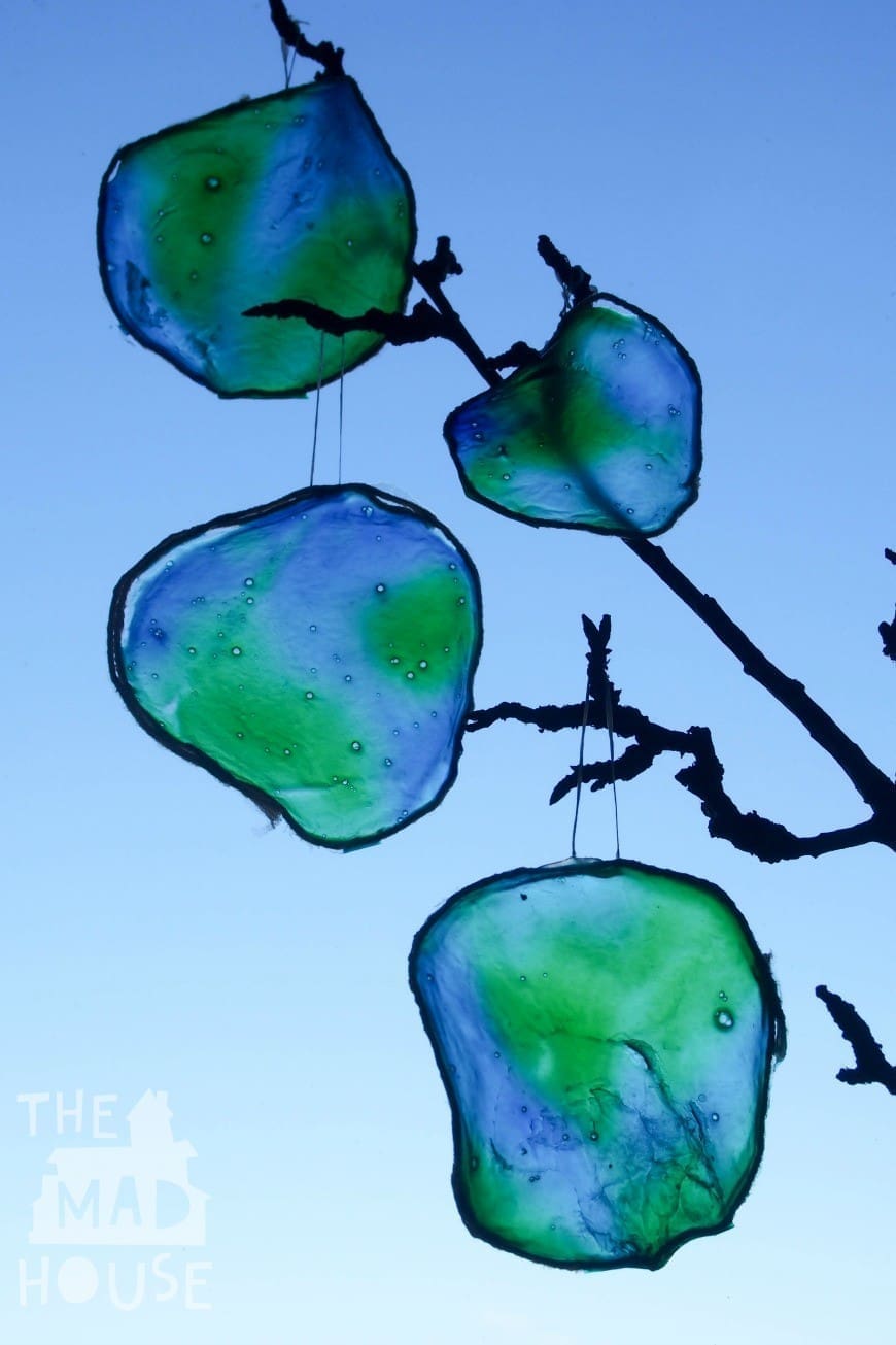 You will never guess what this beautiful stained glass Earth craft is made from. It is a fab fun kids craft perfect for celebrating Earth Day