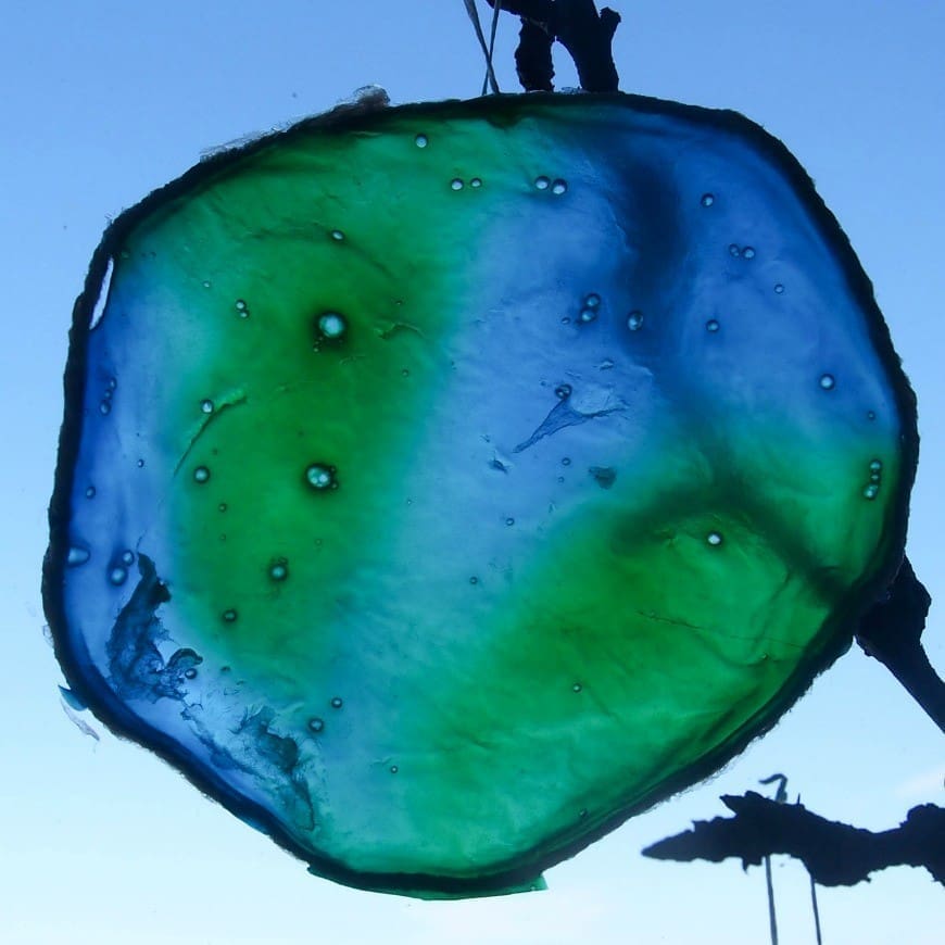 You will never guess what this beautiful stained glass Earth craft is made from. It is a fab fun kids craft perfect for celebrating Earth Day
