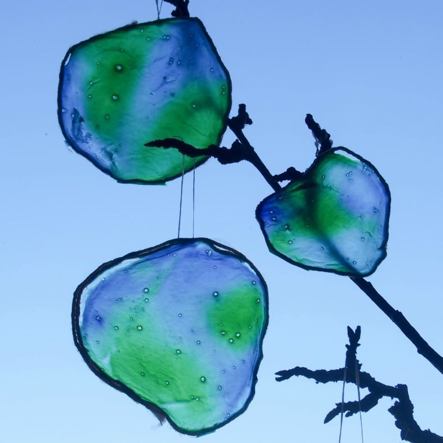 You will never guess what this beautiful stained glass Earth craft is made from. It is a fab fun kids craft perfect for celebrating Earth Day