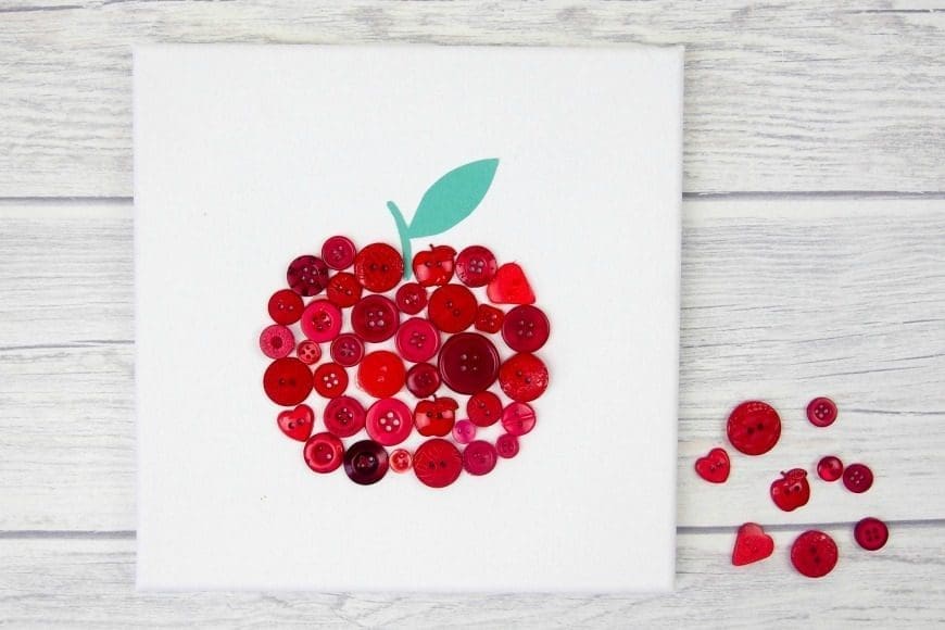 Button Apple Canvas Teacher Gift. This beautiful DIY craft is a perfect teacher appreciation gift that can me made by children.