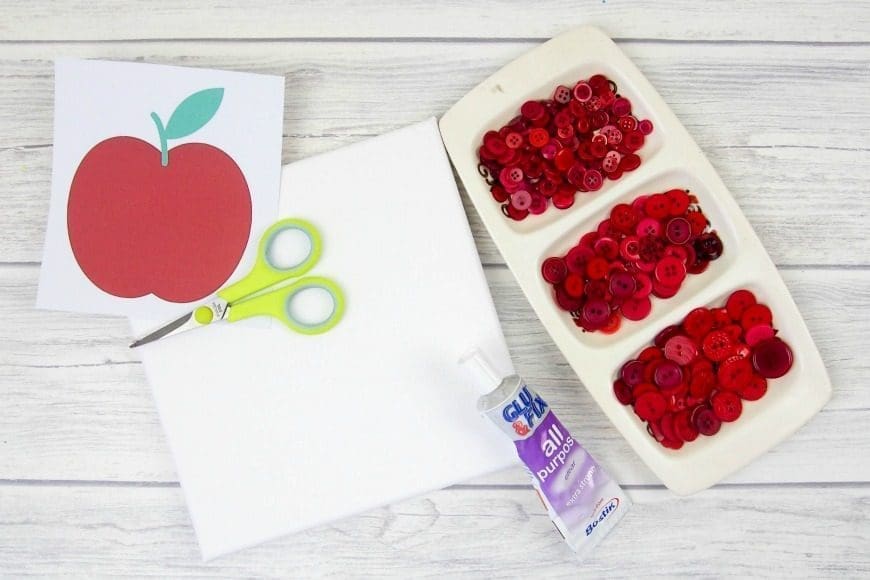 Button Apple Canvas Teacher Gift. This beautiful DIY craft is a perfect teacher appreciation gift that can me made by children.