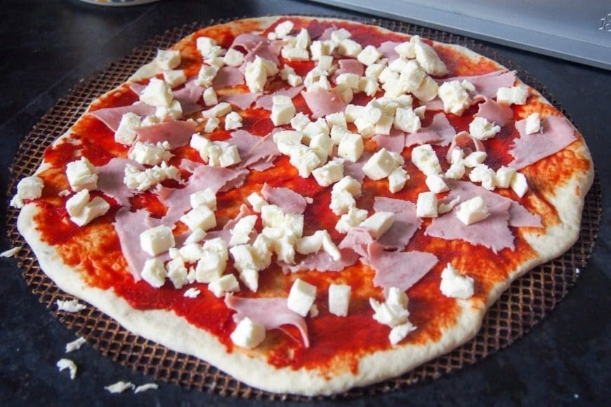 A delicious and fail-safe recipe for perfect breadmaker pizza dough every time. How to make the perfect bread maker pizza dough