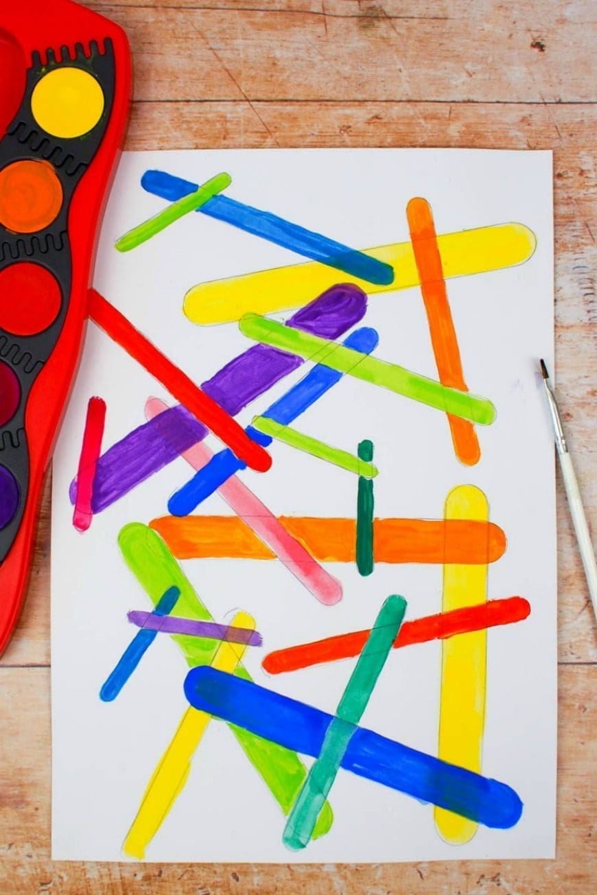 Trace craft sticks to create a beautiful piece of process art. Craft stick process art is a super fun kids craft activity.