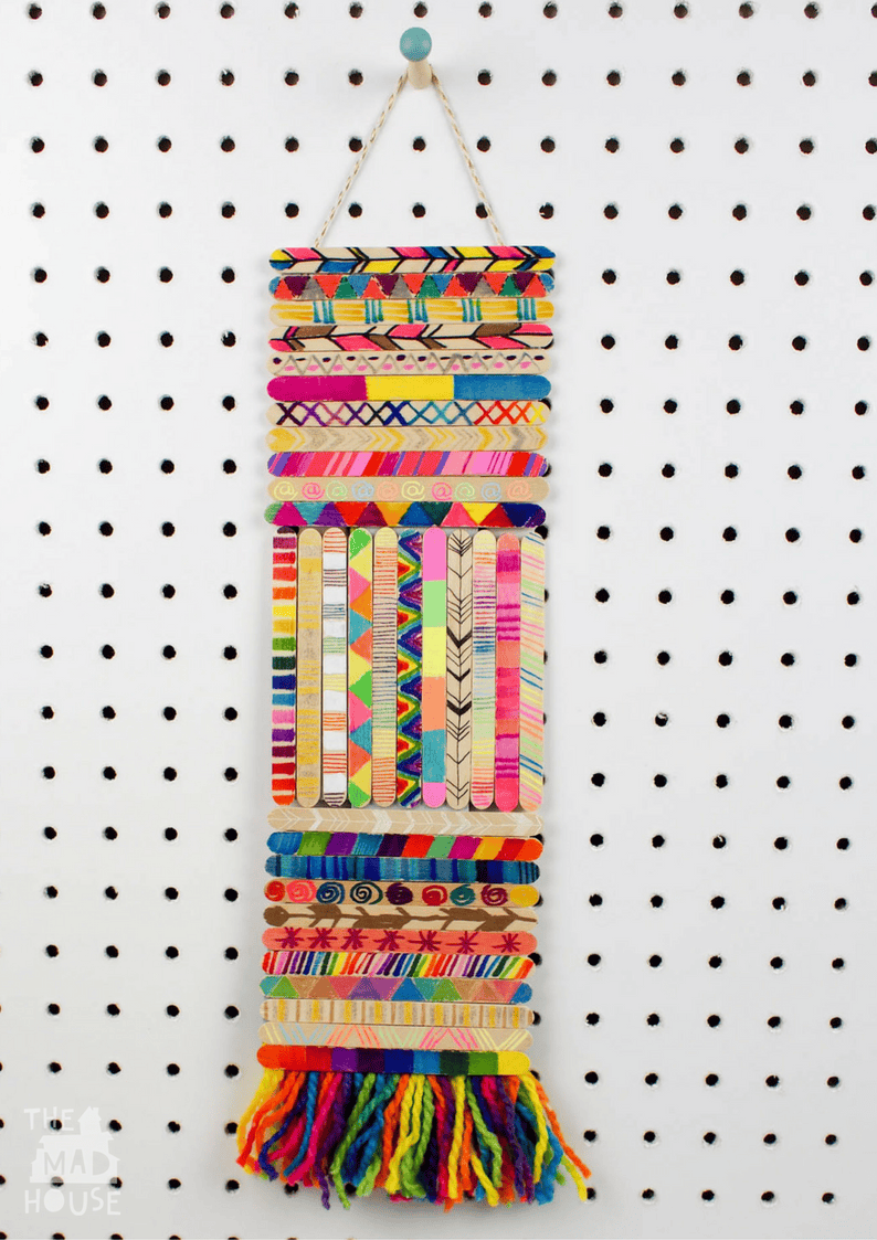 This craft stick wall hanging is a super fun collaborative art project or perfect for making over a period of time.