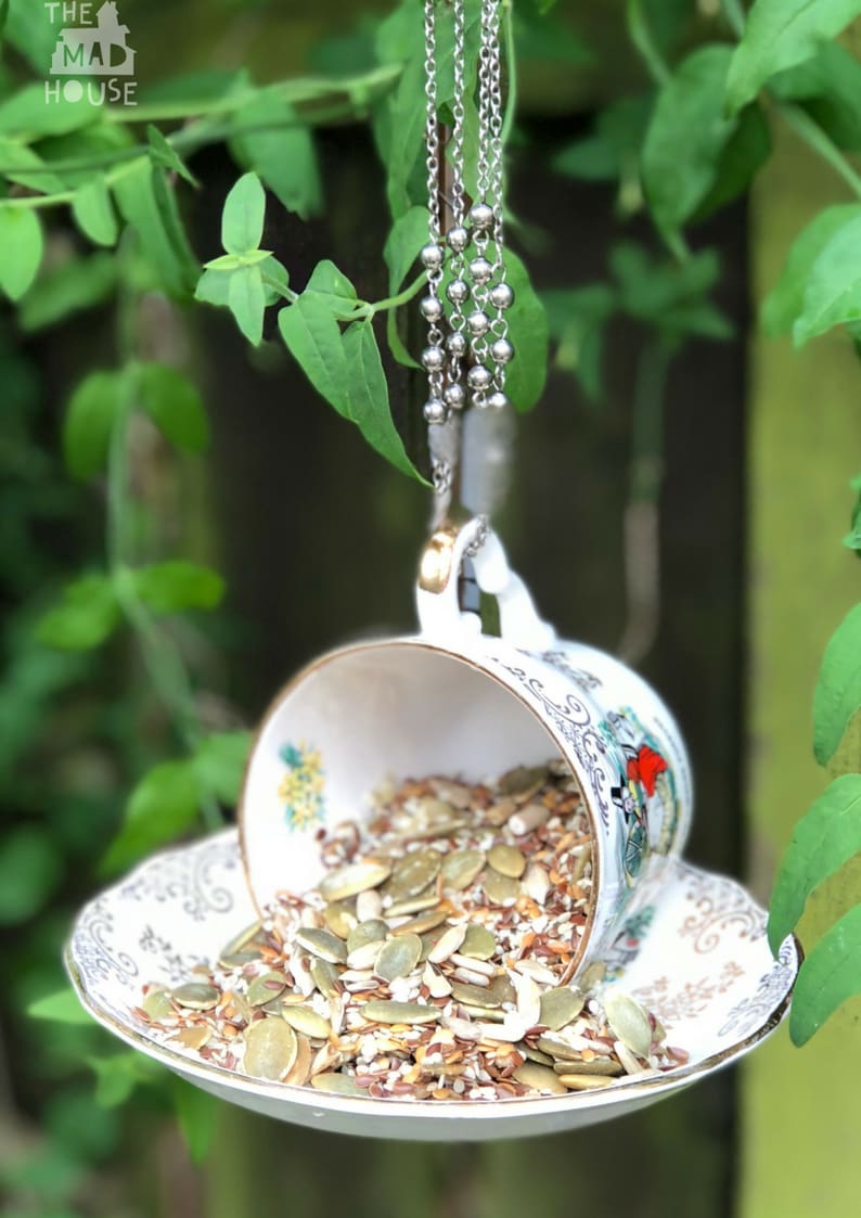 These DIY Teacup Bird Feeders are super cute and so easy to make. They are a brilliant way to use teacups and saucers that I keep collecting from charity shops. Nothing beats watching birds in your backyard and this hanging Teacup Bird Feeder DIY is super easy to make.
