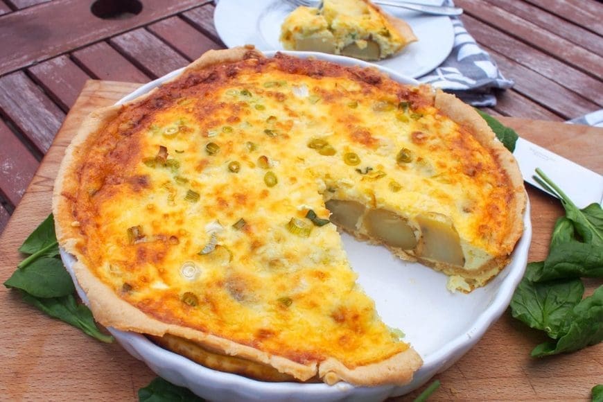 New potato, spring onion & cheddar quiche