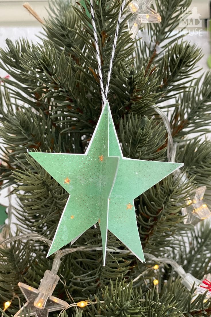 Use our Free Printable Christmas Star Ornaments with Templates to make beautiful DIY holiday tree decorations.  The Star Ornament template is designed to be easy to print, cut out, and use.