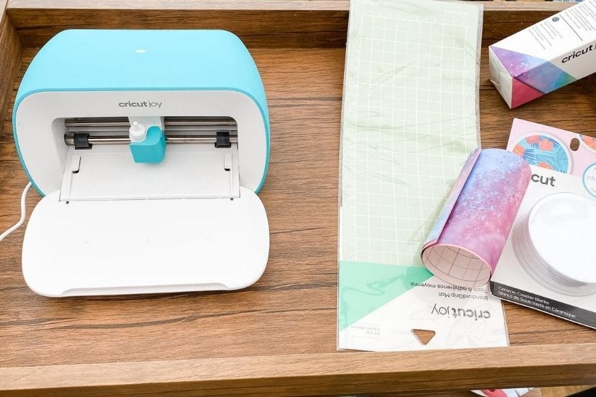 Cricut joy and materials to make DIY coasters with infusible ink