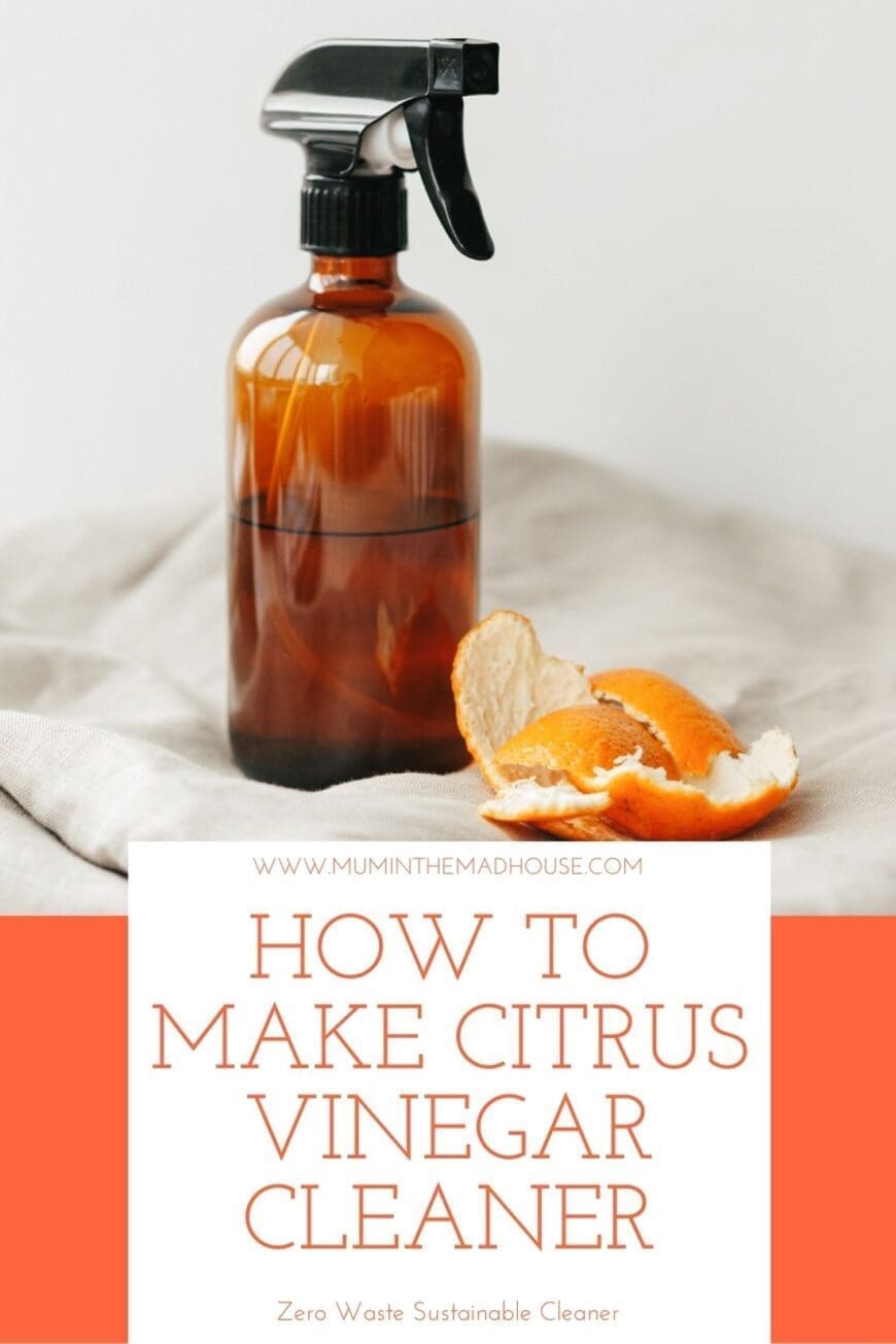 A brown Spray bottle containing citrus infused vinegar 