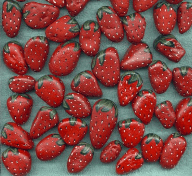 Rocks painted to look like strawberries