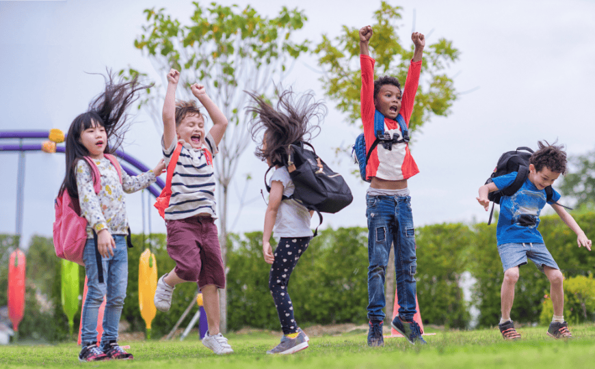 5 Children jumping and counting outside