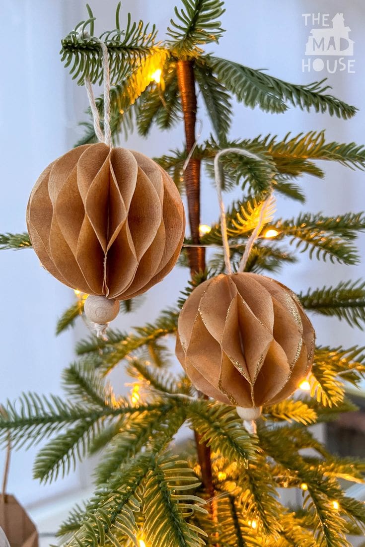 Make beautiful honeycomb Christmas ornaments using coffee filters! A fun, easy, and budget-friendly DIY project that adds festive charm to your holiday decor.