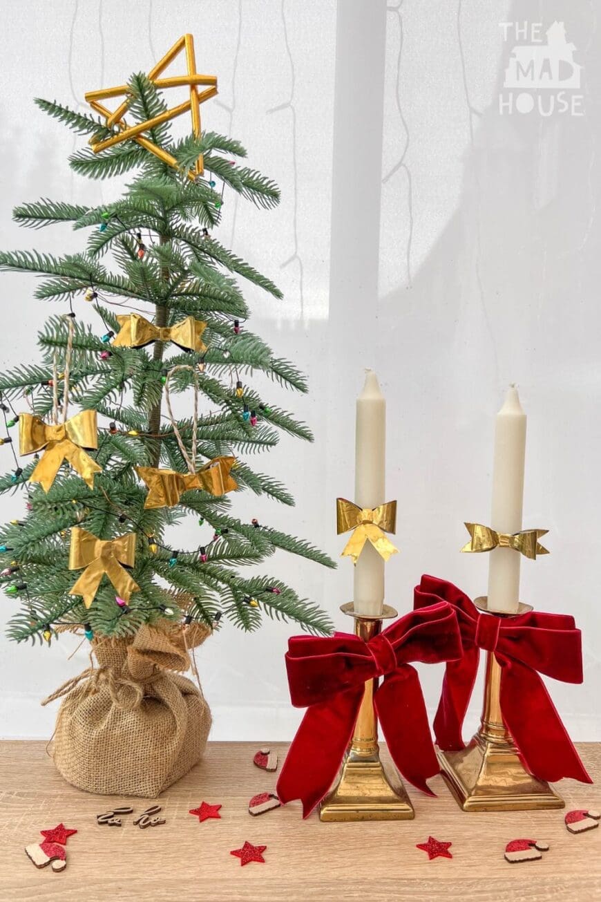 Bring timeless elegance to your holiday décor with DIY brass bow candle pins and tree ornaments. Made from upcycled materials, these are budget-friendly and beautiful!