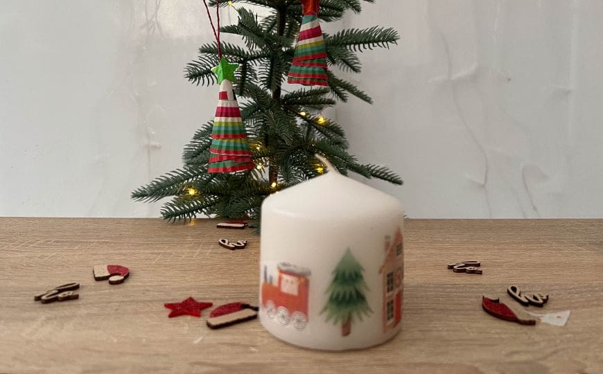 Turn plain candles into stunning Christmas decor with decorative napkins! Easy and budget-friendly, these candles make perfect handmade gifts or holiday accents.