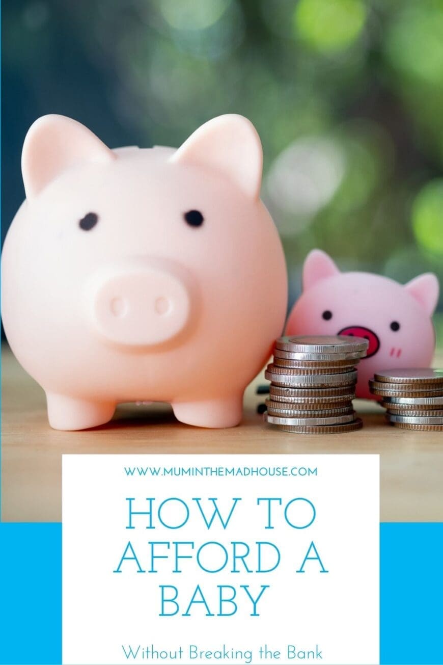 Close-up of a large piggy bank beside stacked coins with a smaller piggy bank in the background. The text overlay reads “How to Afford a Baby – Without Breaking the Bank” from www.muminthemadhouse.com.