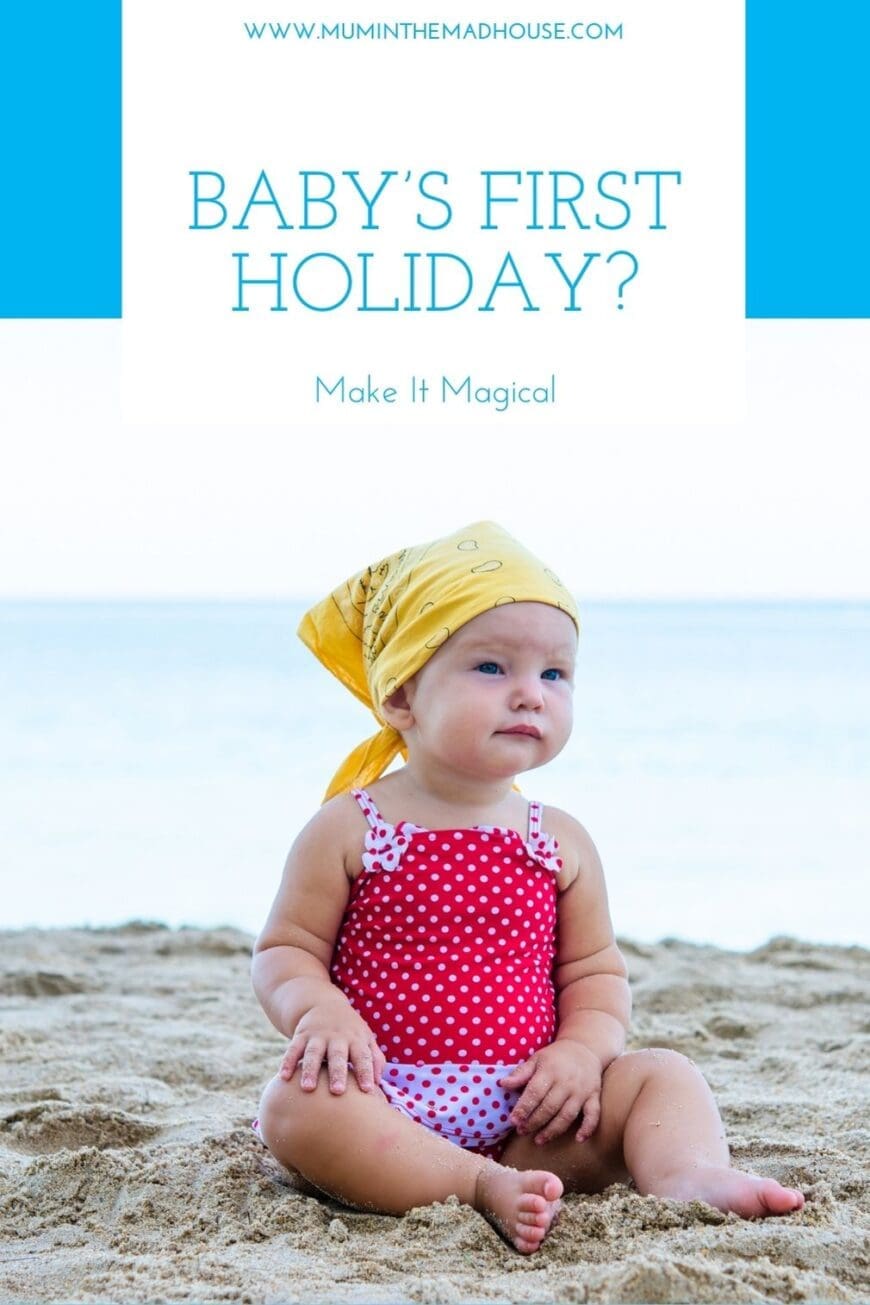 Baby in a red polka dot swimsuit and yellow bandana sitting on the beach, gazing thoughtfully toward the sea on their first seaside holiday.