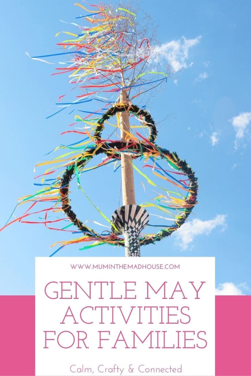 Bright and colourful maypole decorated with rainbow ribbons against a clear blue sky, with text overlay that reads “Gentle May Activities for Families – Calm, Crafty & Connected” from Mum in the Mad House.