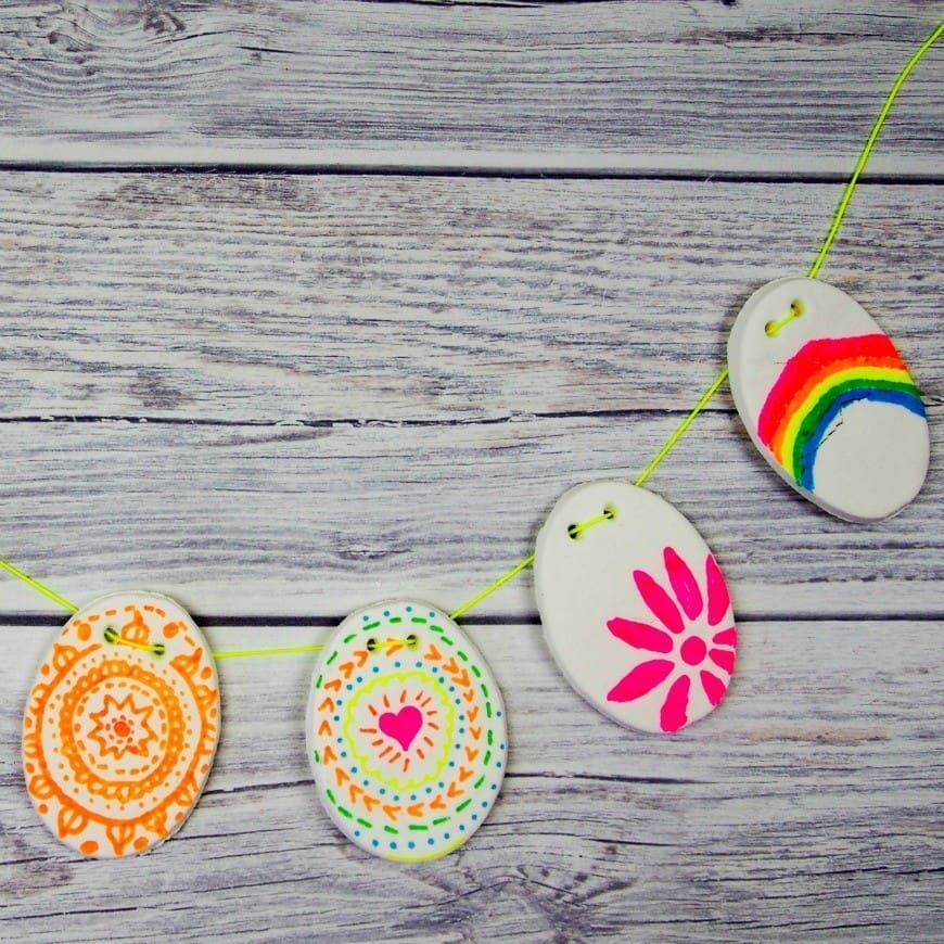 A DIY clay recipe and beautiful DIY Clay Easter bunting a great kids DIY craft for Easter. This DIY clay recipe has only two ingredients and you can colour on it with markers and felt tips. It has to be seen to be believed.