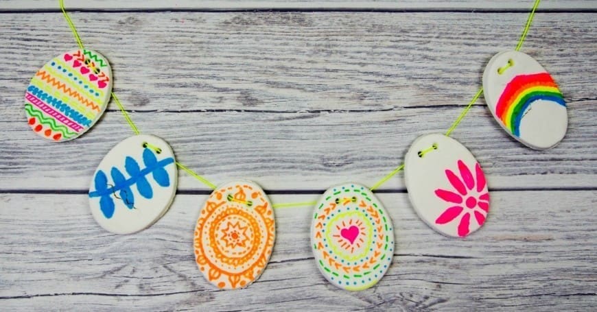A DIY clay recipe and beautiful DIY Clay Easter bunting a great kids DIY craft for Easter. This DIY clay recipe has only two ingredients and you can colour on it with markers and felt tips. It has to be seen to be believed.